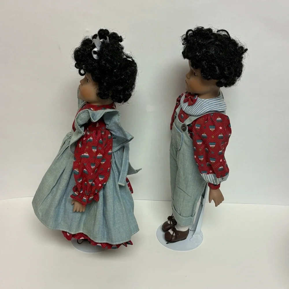 Delton Product Corp. Porcelain Brown Boy Girl Dolls Stands Matching Outfits